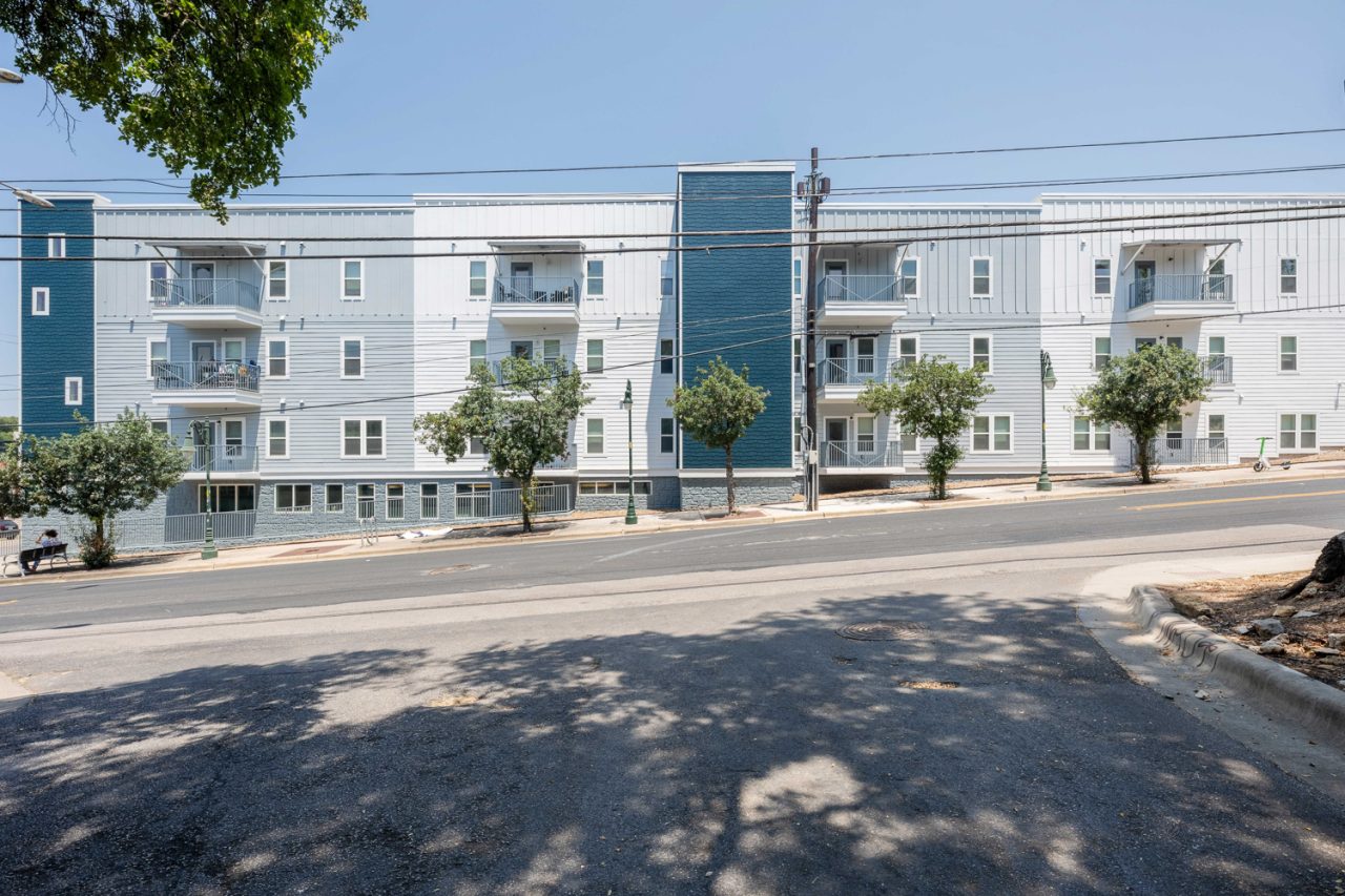 24-longview-apartments-near-ut-austin-community-building-exterior